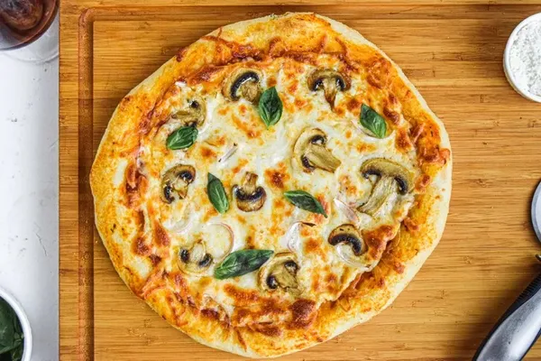 The pizza dough recipe makes enough dough for two 10 to 12 i