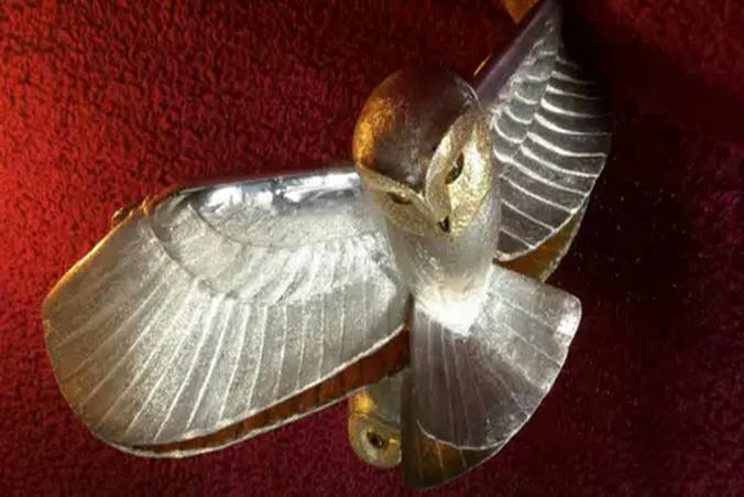 An owl statuette which was buried 31 years ago as part of a 