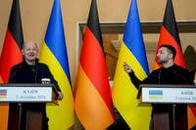 German Leader Scholz Vows More Ukraine Aid and Defends His P